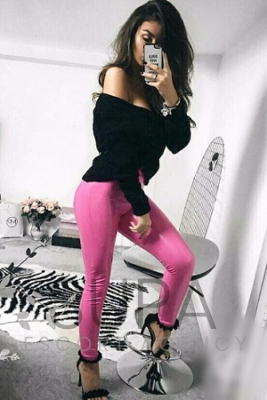 Cara wearing sexy black top and pink leggings in high heels 